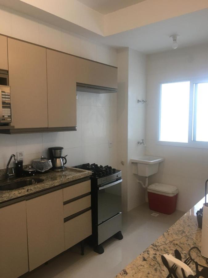 Apartamento Bertioga Torres Esterno foto