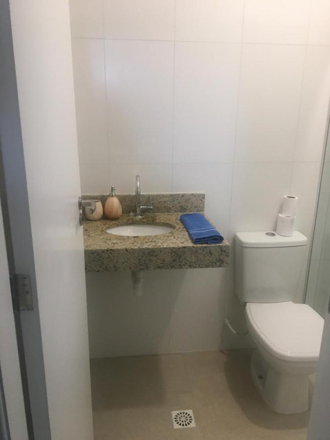 Apartamento Bertioga Torres Esterno foto
