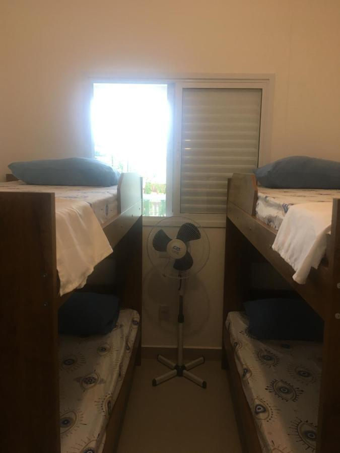 Apartamento Bertioga Torres Esterno foto
